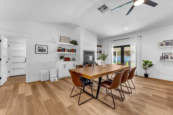 a kitchen with a sink and stove