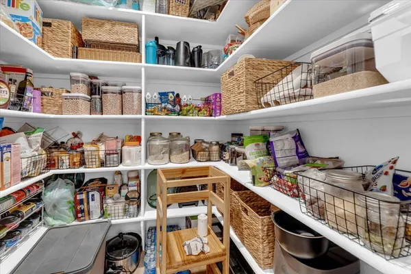 a bathroom with a sink a mirror and a toilet