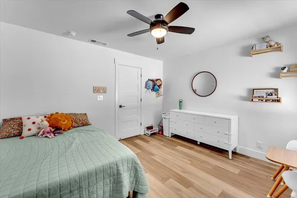 a view of a house with pool and sitting area
