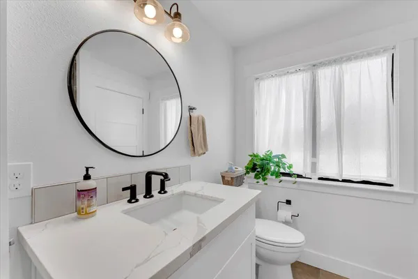 a backyard of a house with seating space