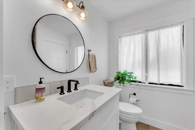 a backyard of a house with seating space