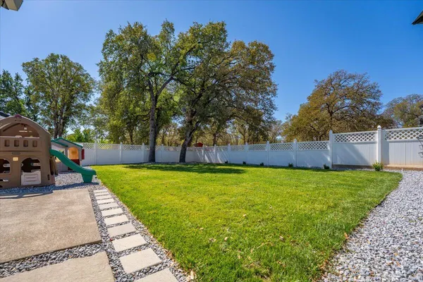 a view of a yard with mountain view