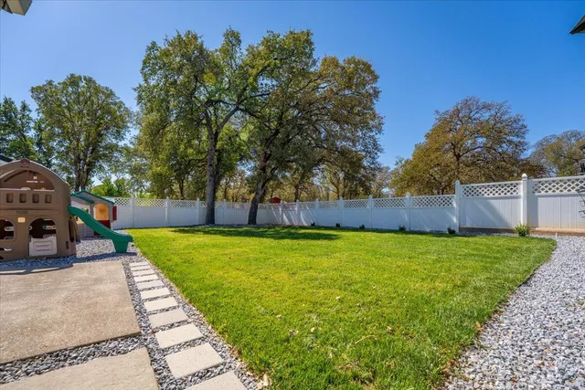 a view of a yard with mountain view