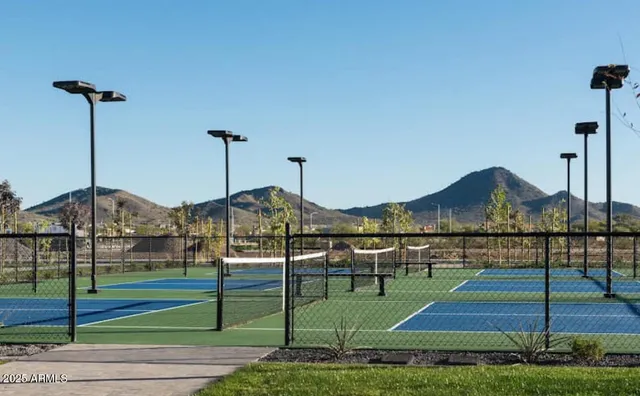 a view of a house and a yard