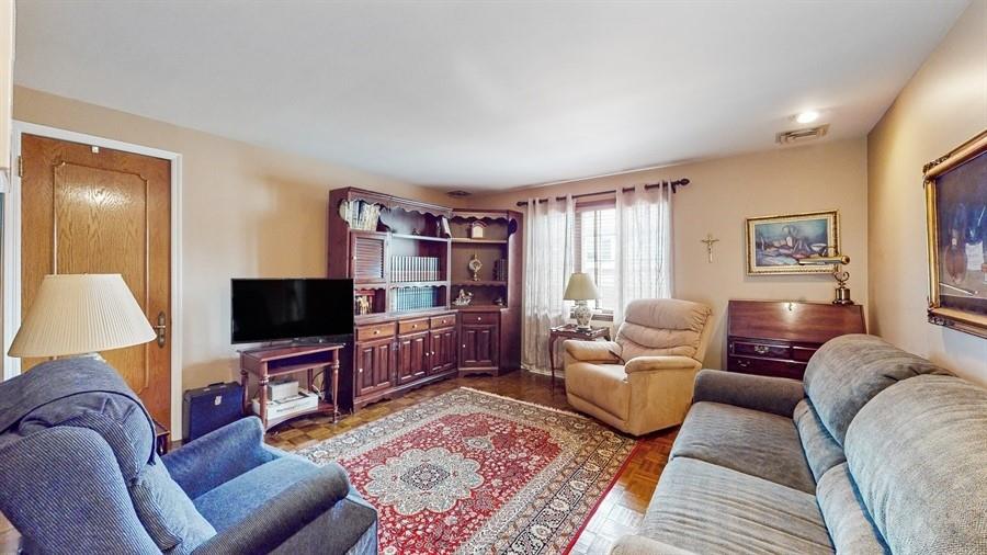 169 84th Street Brooklyn, NY 11209 - Photo 17 of 40 a living room with furniture and a flat screen tv