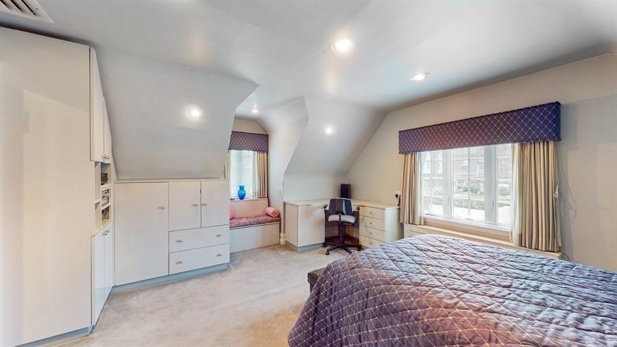 169 84th Street Brooklyn, NY 11209 - Photo 24 of 40 a bedroom with a bed and window