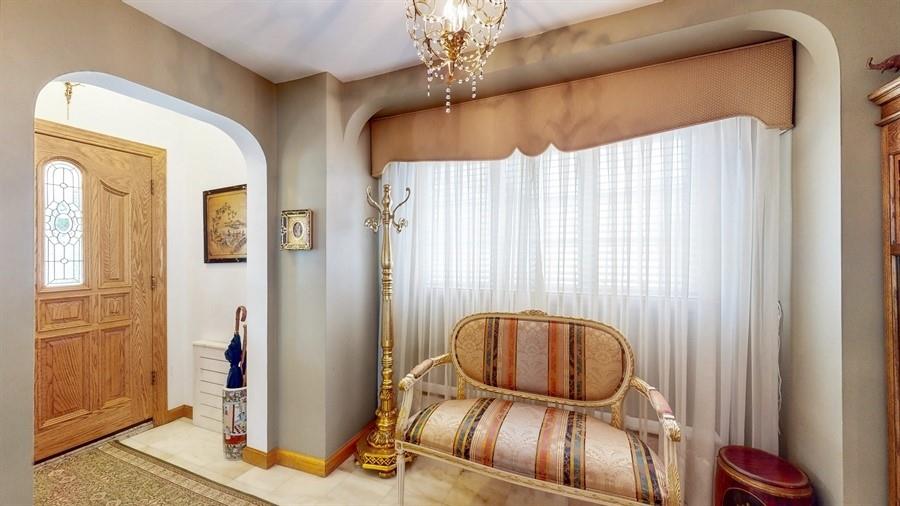 169 84th Street Brooklyn, NY 11209 - Photo 4 of 40 a picture of a room with wooden floor and windows