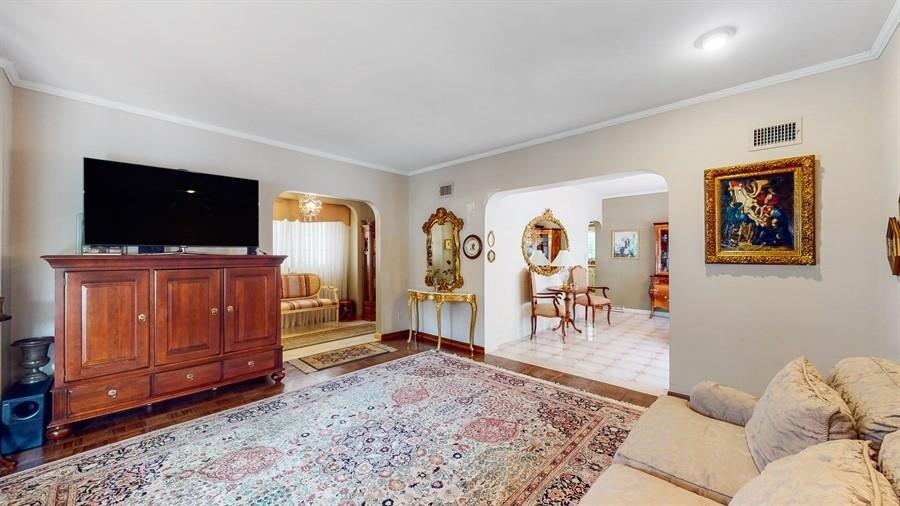169 84th Street Brooklyn, NY 11209 - Photo 5 of 40 a living room with furniture and wooden floor