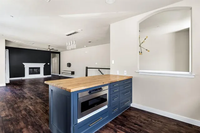a kitchen with a stove and a sink