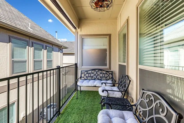 a balcony with furniture