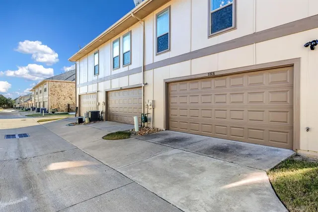 a view of a house with garage
