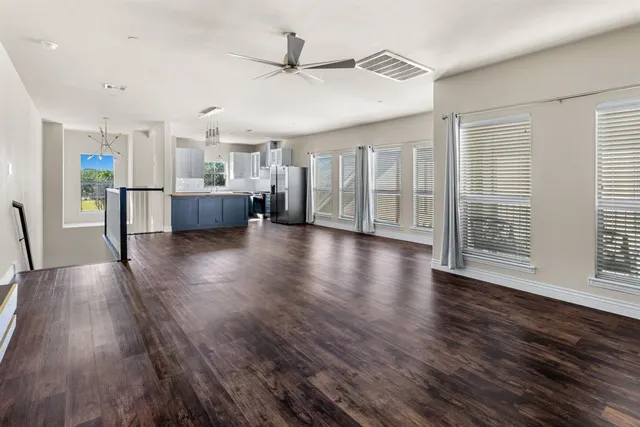 a view of a living room and hardwood floor