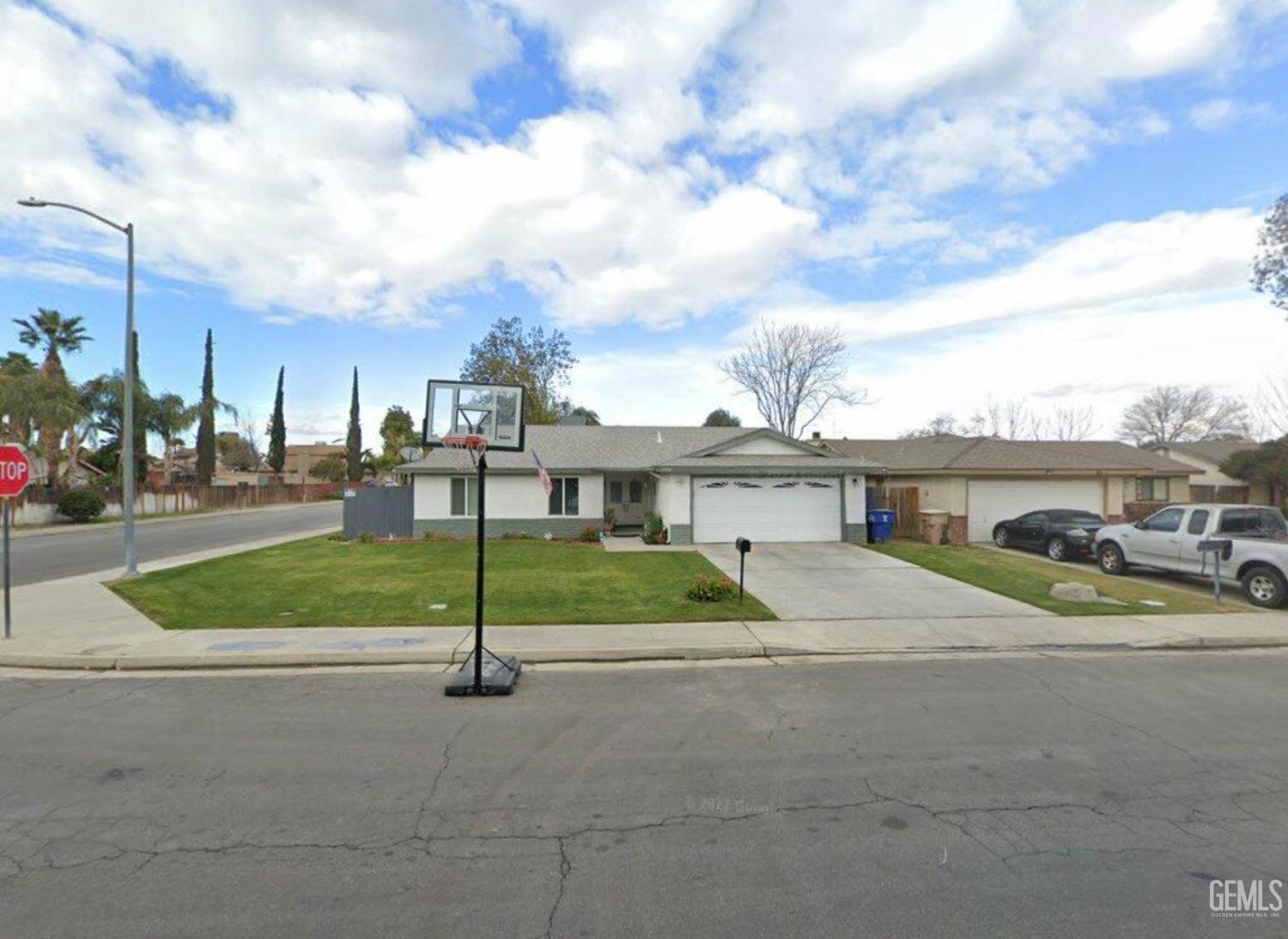 a house view with a garden space