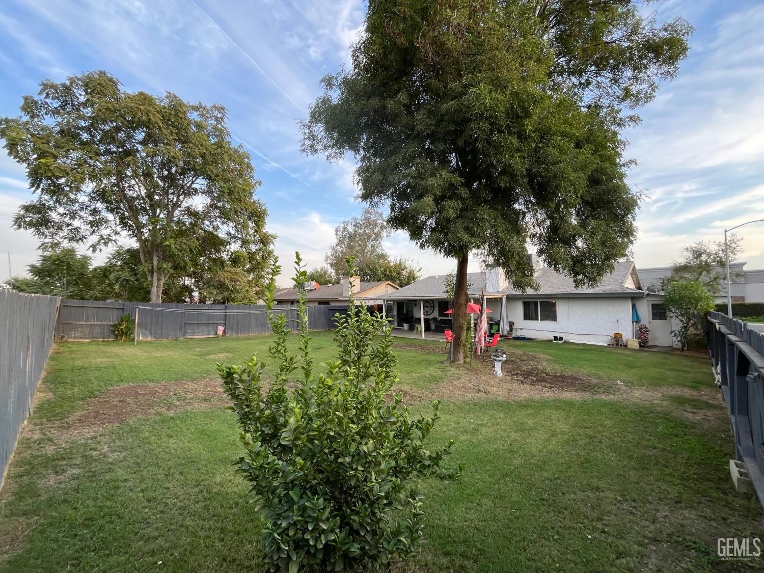 Undisclosed Address Bakersfield, CA 93304 - Photo 32 of 33 a backyard of a house with barbeque oven and plants