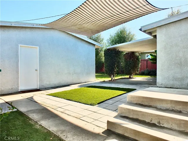 a view of swimming pool with patio