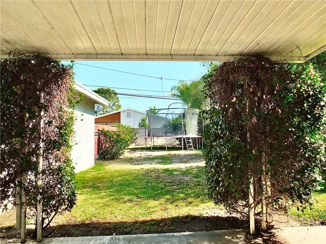 a view of a back yard of the house