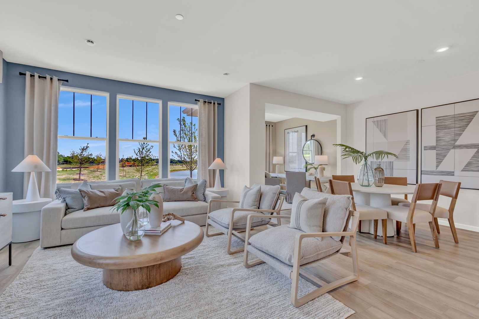 5913 Hawkweed Drive, Unit 8704 Plainfield, IL 60585 - Photo 12 of 17 a living room with fireplace furniture and a large window