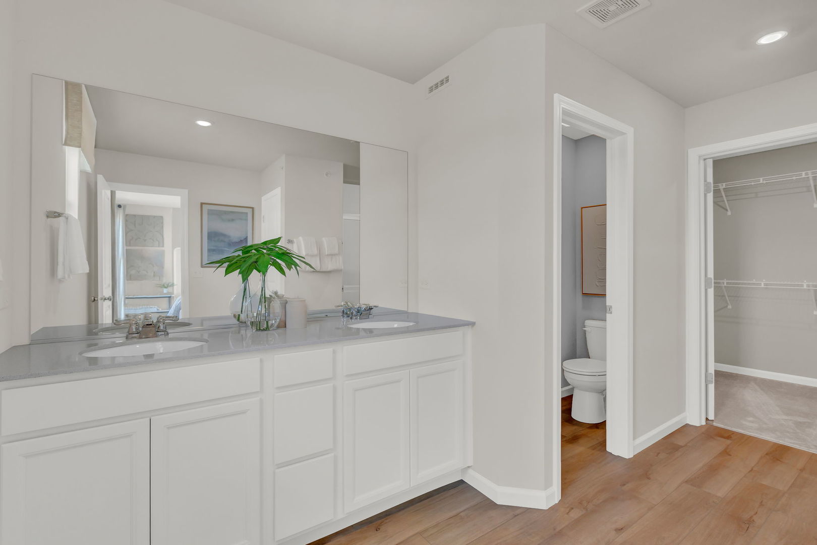 5913 Hawkweed Drive, Unit 8704 Plainfield, IL 60585 - Photo 14 of 17 a bathroom with a granite countertop sink and a mirror