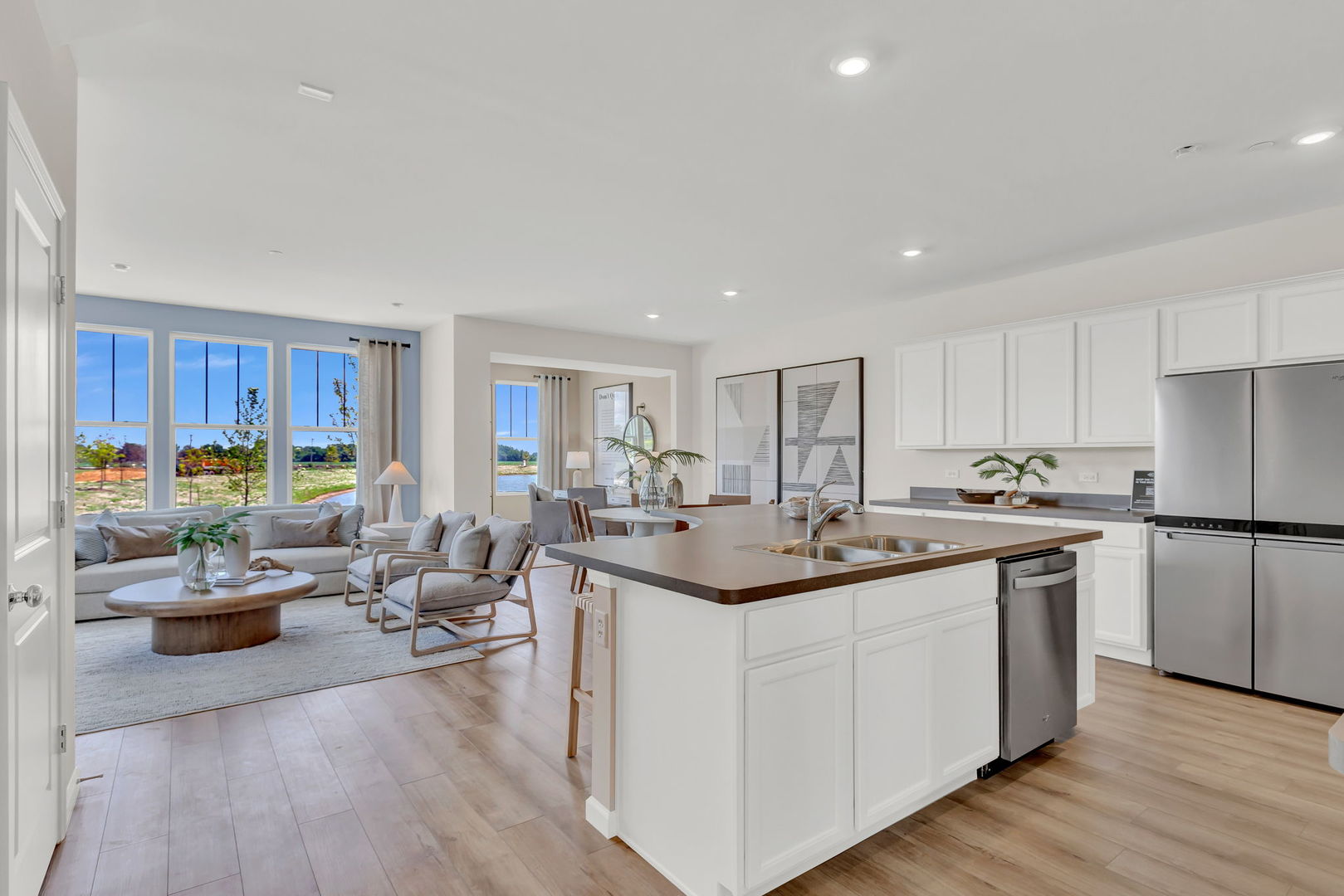 5913 Hawkweed Drive, Unit 8704 Plainfield, IL 60585 - Photo 9 of 17 a kitchen with sink and cabinets
