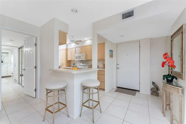 a kitchen with a sink and a stove top oven