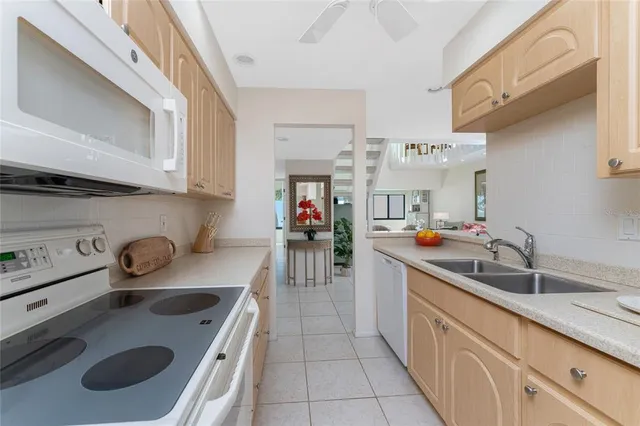 a reading room with furniture and a window