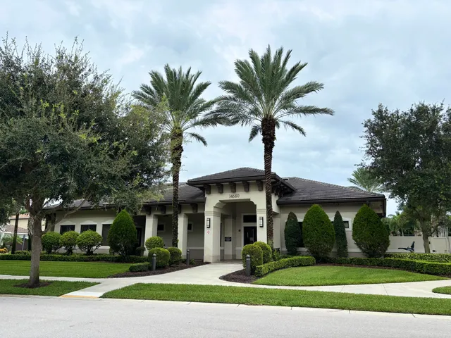 a picture of a open kitchen with stainless steel appliances