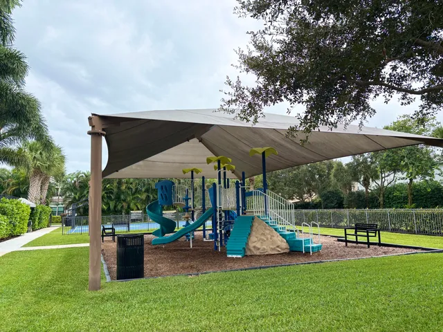 a view of a backyard with sitting area and furniture