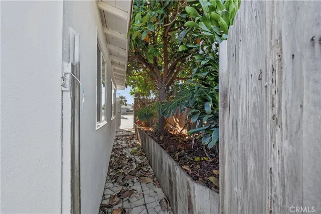 a view of a pathway of a wooden door
