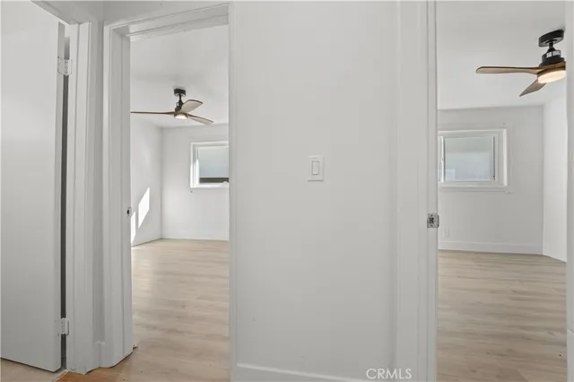 a view of a bathroom from the hallway