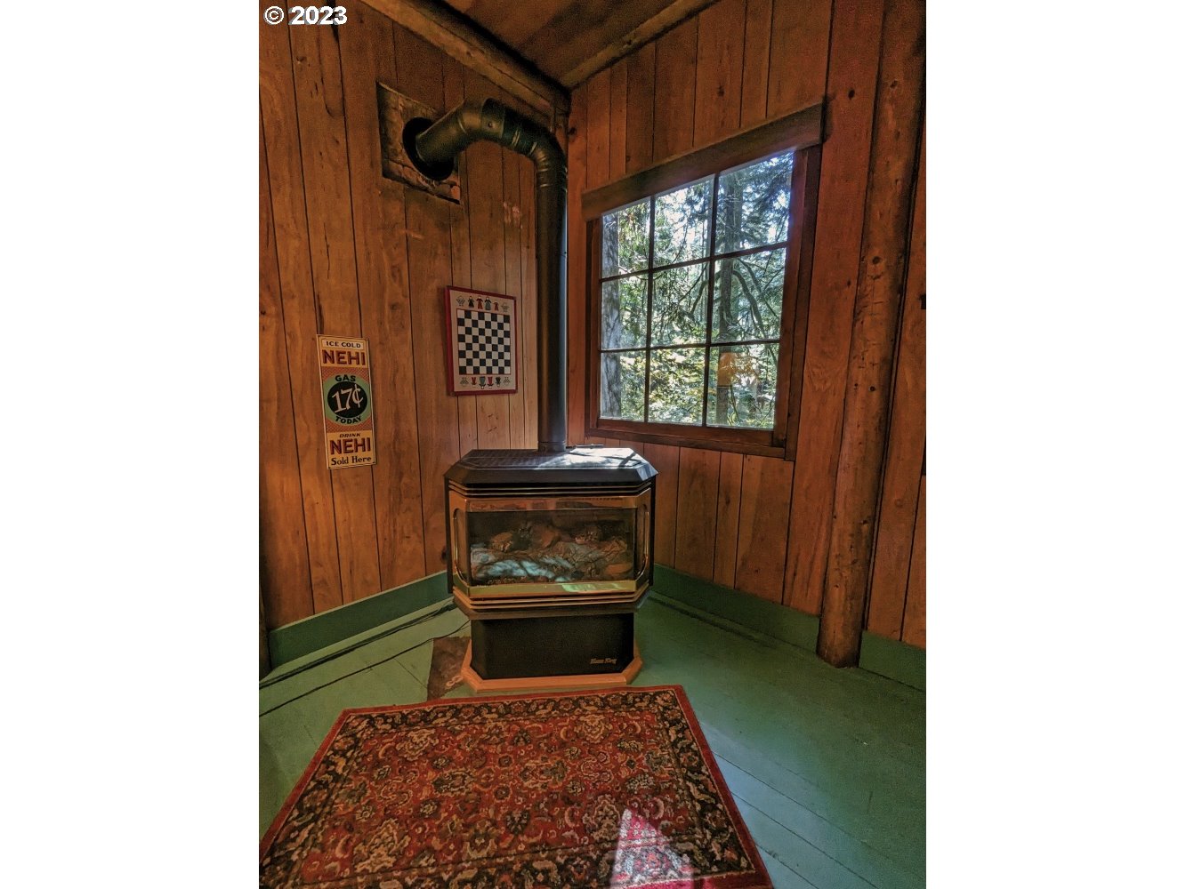 79128 Road 35 A Rhododendron, OR 97049 - Photo 12 of 36 a bedroom with a bed and a window