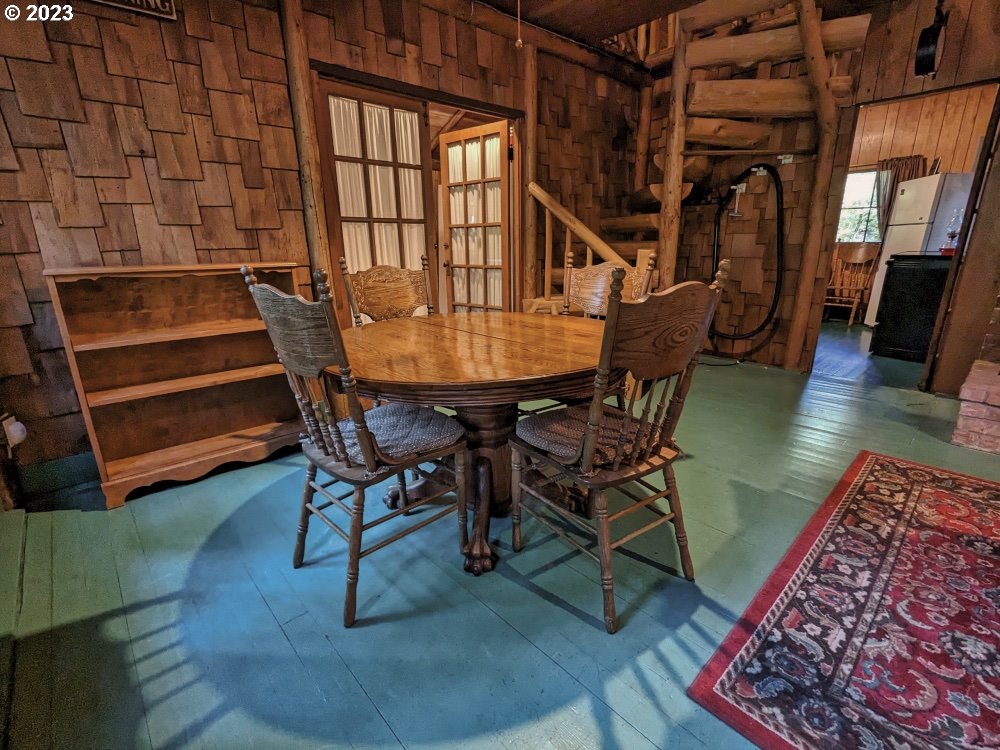 79128 Road 35 A Rhododendron, OR 97049 - Photo 14 of 36 a dining room with furniture and a rug