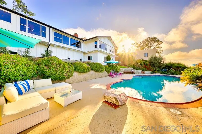 1106 Muirlands Drive La Jolla, CA 92037 - Photo 21 of 24 a view of a swimming pool with a patio