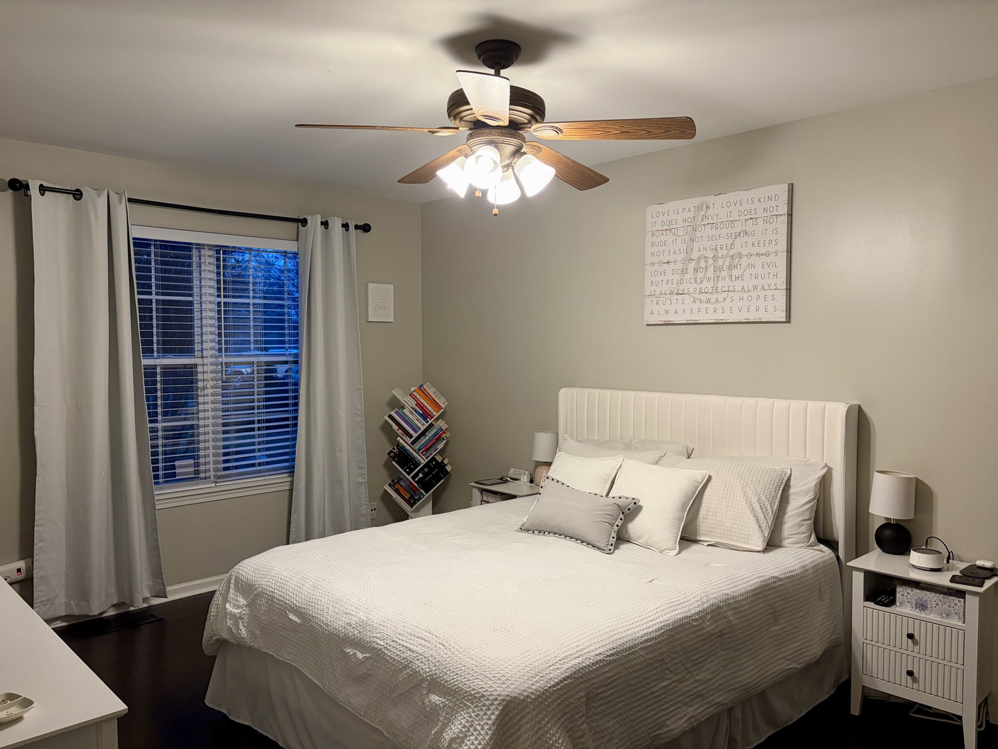 350 Crystal Ridge Drive, Unit 350 Crystal Lake, IL 60012 - Photo 12 of 18 a bedroom with a bed and a chandelier