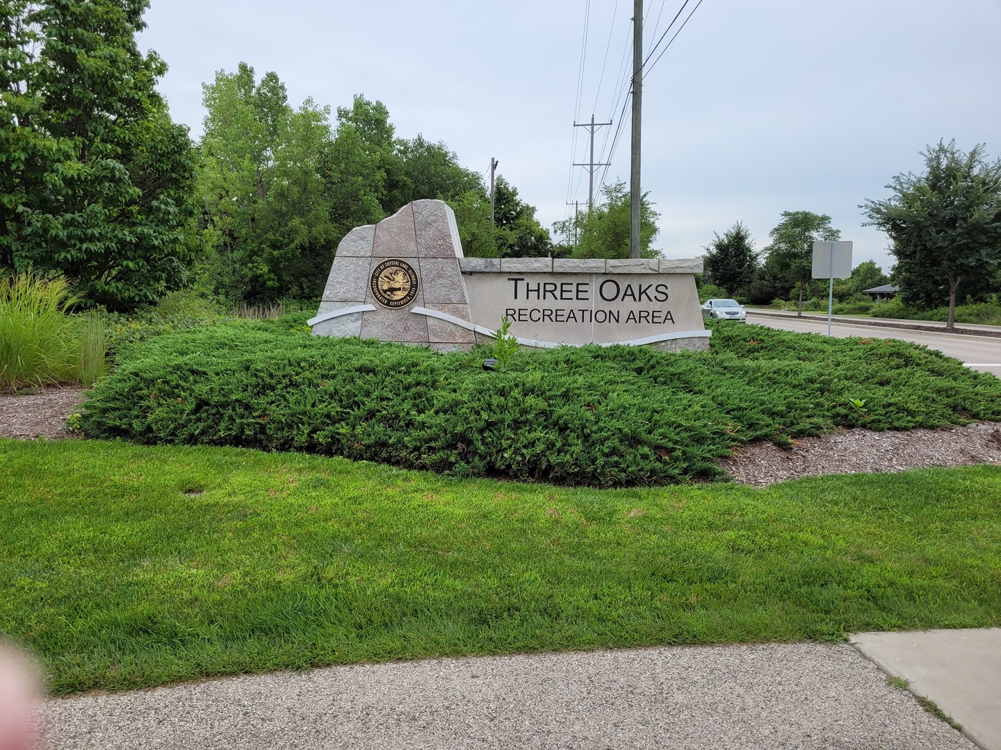 350 Crystal Ridge Drive, Unit 350 Crystal Lake, IL 60012 - Photo 15 of 18 a view of a park that has a sign on it