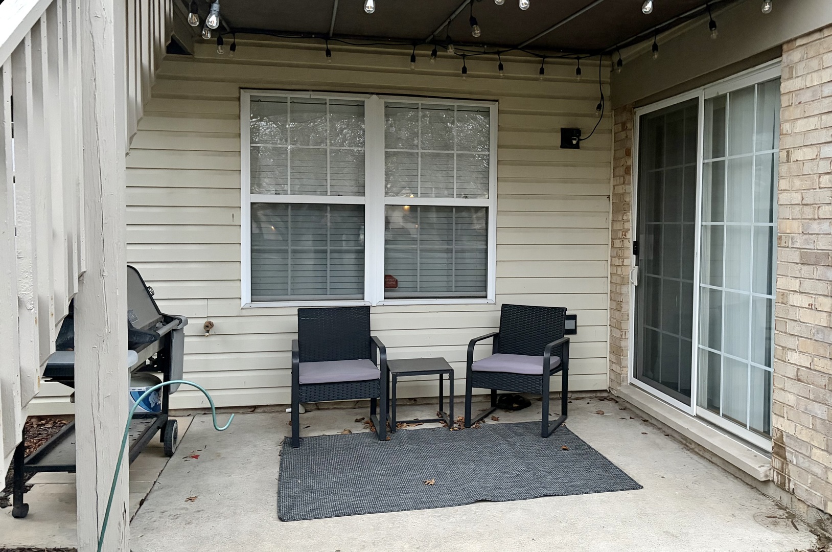 350 Crystal Ridge Drive, Unit 350 Crystal Lake, IL 60012 - Photo 4 of 18 a balcony with table and chairs