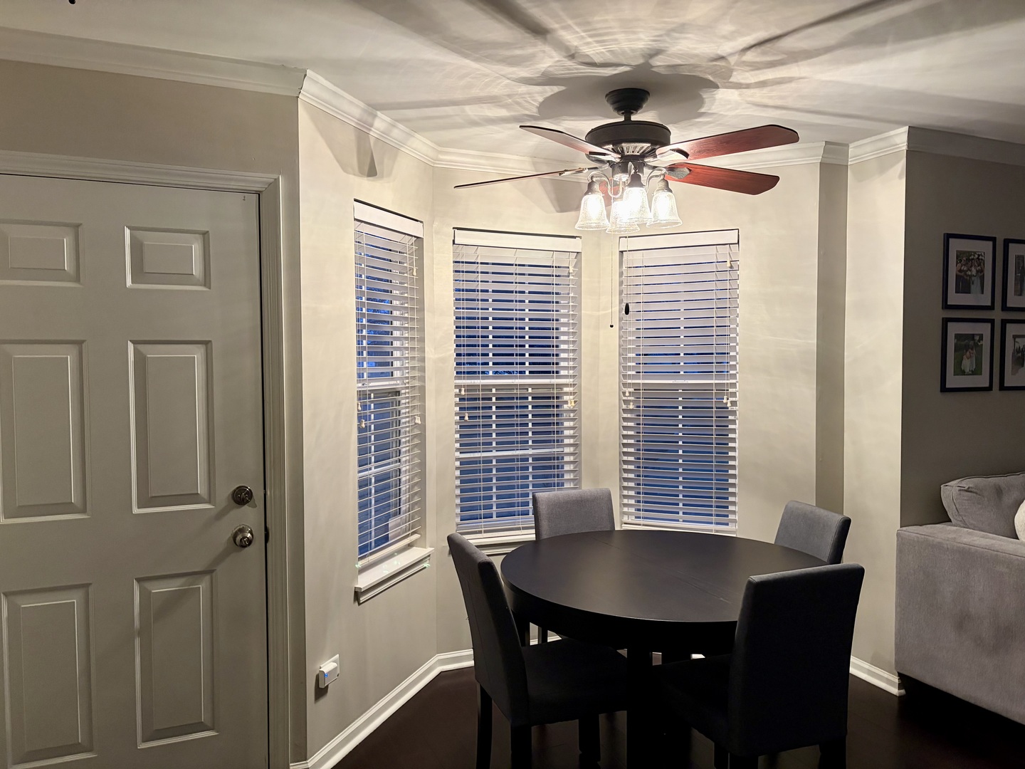 350 Crystal Ridge Drive, Unit 350 Crystal Lake, IL 60012 - Photo 7 of 18 a view of a dining room with furniture and a chandelier