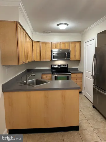 a bathroom with a toilet and shower