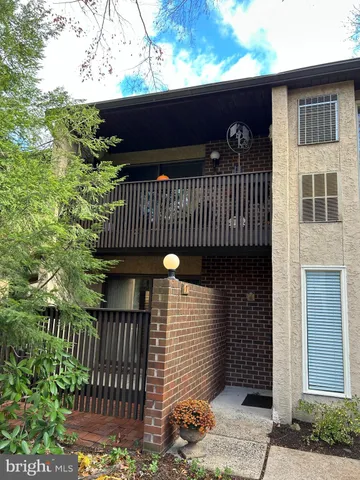 a view of a balcony with a swing