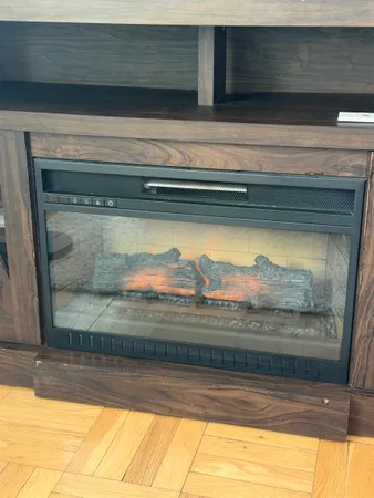 a bedroom with a bed and glass window