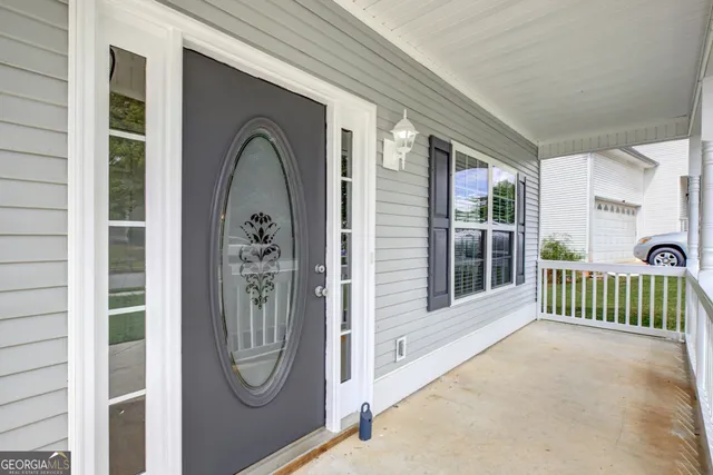 a view of a entryway door front of house