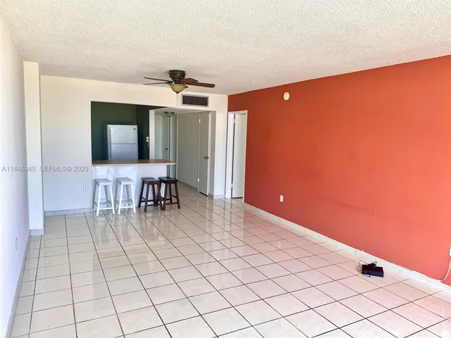 a view of a livingroom with furniture