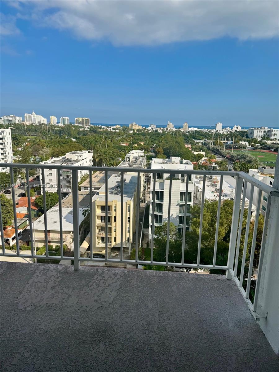 1228 West Avenue, Unit 1109 Miami Beach, FL 33139 - Photo 9 of 10 a view of a terrace with lawn chairs