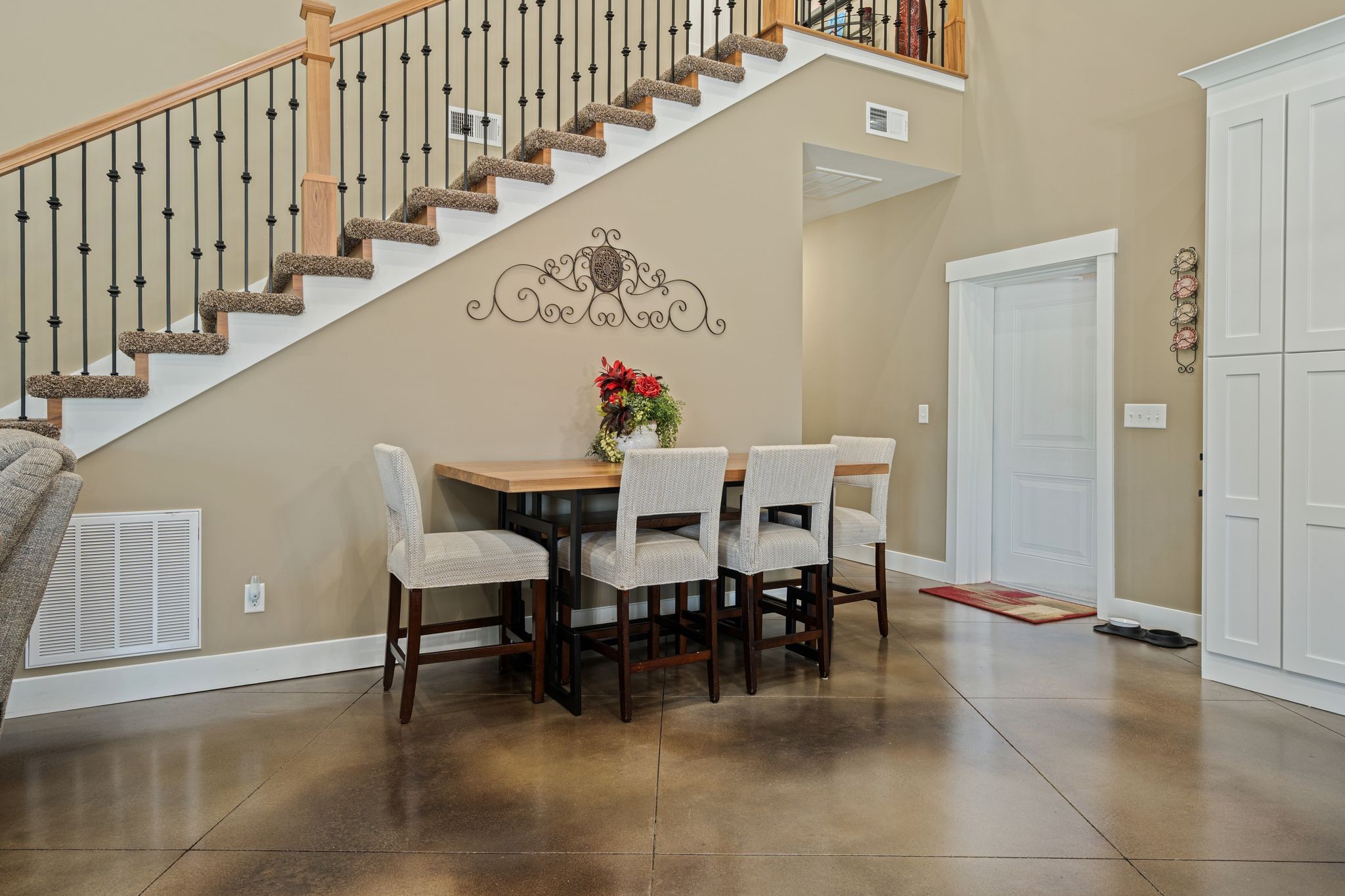 201 Graves Road Goodlettsville, TN 37072 - Photo 16 of 70 a view of a dining room with wooden floor and stairs