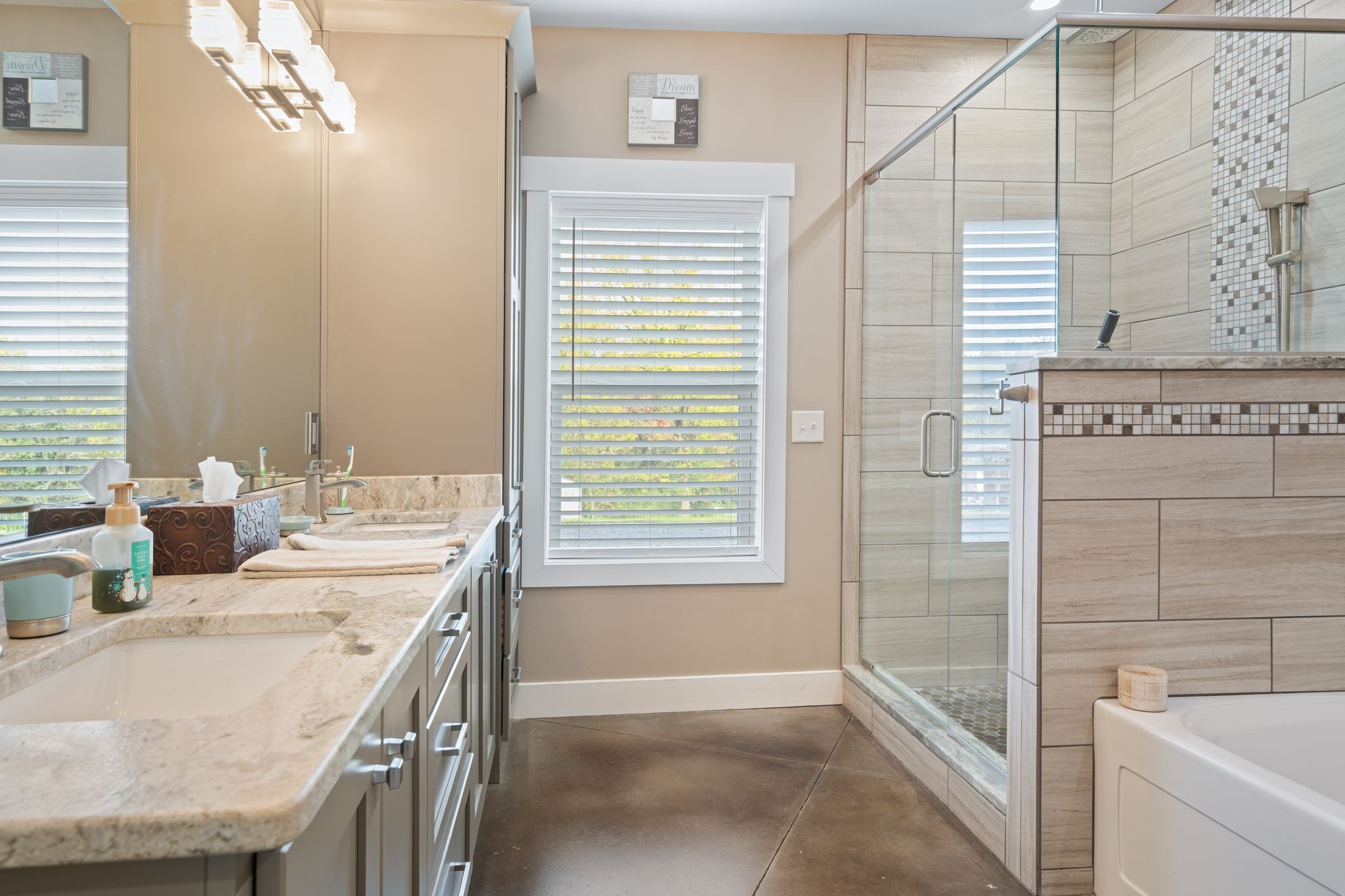 201 Graves Road Goodlettsville, TN 37072 - Photo 20 of 70 a bathroom with a granite countertop sink a toilet and shower