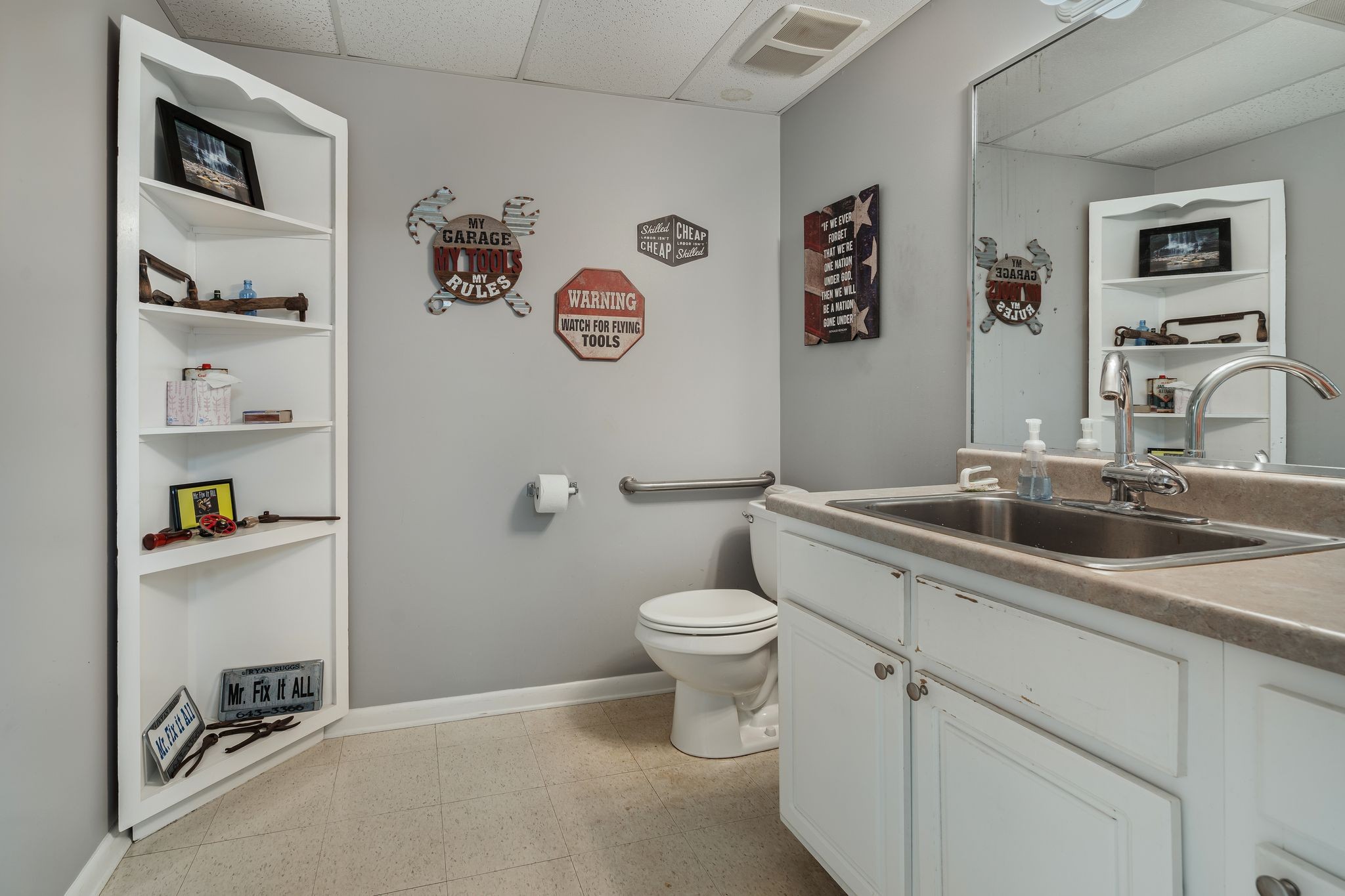 201 Graves Road Goodlettsville, TN 37072 - Photo 50 of 70 a bathroom with a sink a toilet and a mirror