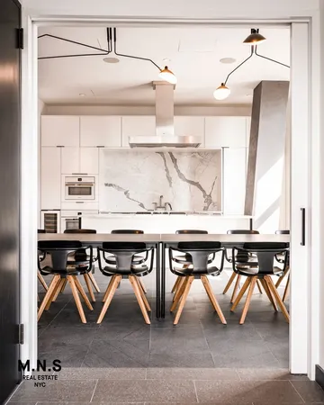 a bathroom with a sink and a shower curtain