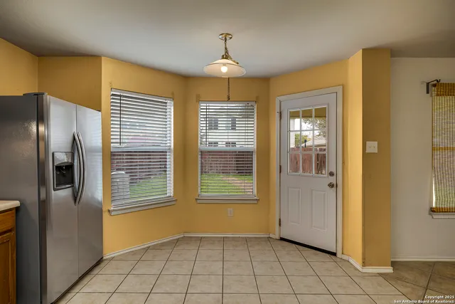 a view of an empty room with window