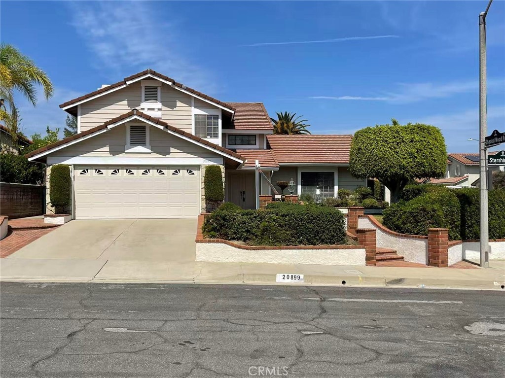20899 Starshine Road Walnut, CA 91789 - Photo 1 of 1 a front view of a house with a yard
