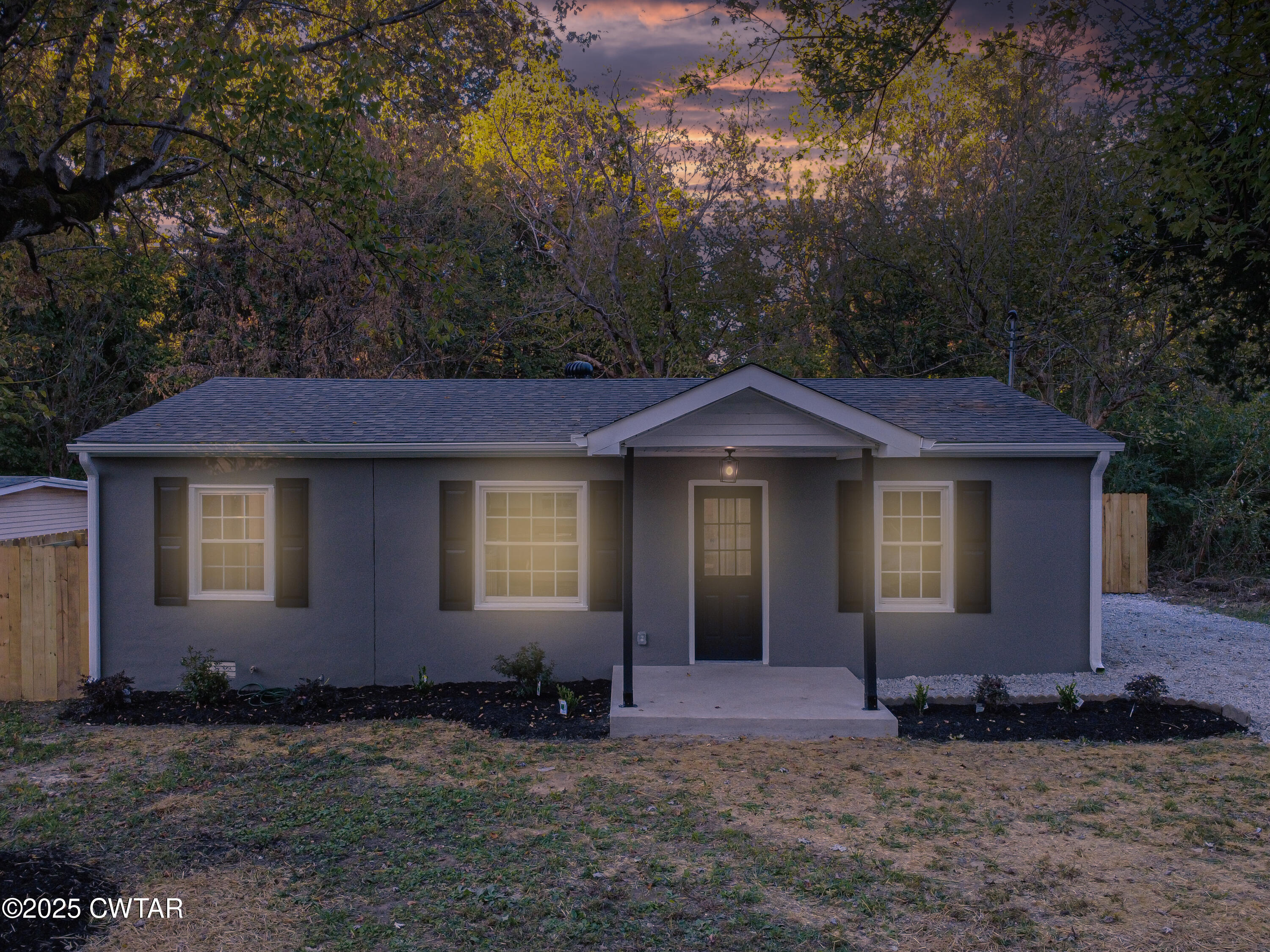 107 Lower Brownsville Road Jackson, TN 38301 - Photo 1 of 17 a view of a house with a yard