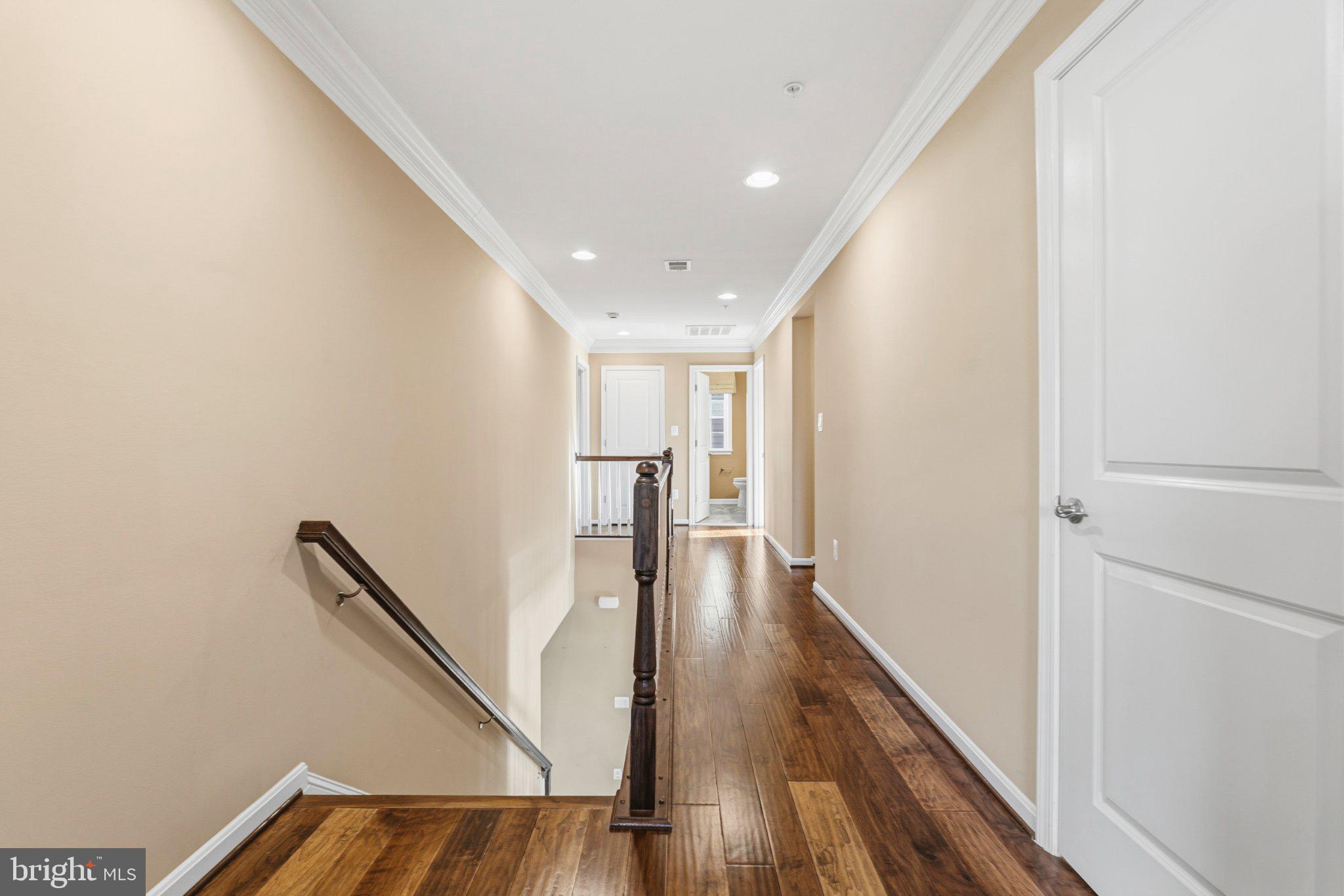 731 Holden Road Frederick, MD 21701 - Photo 35 of 78 Inviting hallway with warm tones.